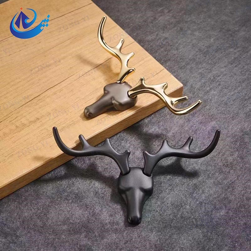 Cosa rende i moderni ganci per i vestiti a monte decorativi del design un accessorio per la casa?